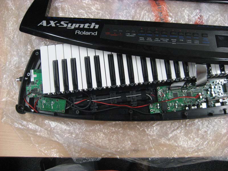 Overview of the AX Synth after the modification. Widi-X8 PCB is on the far left where the straplock is.