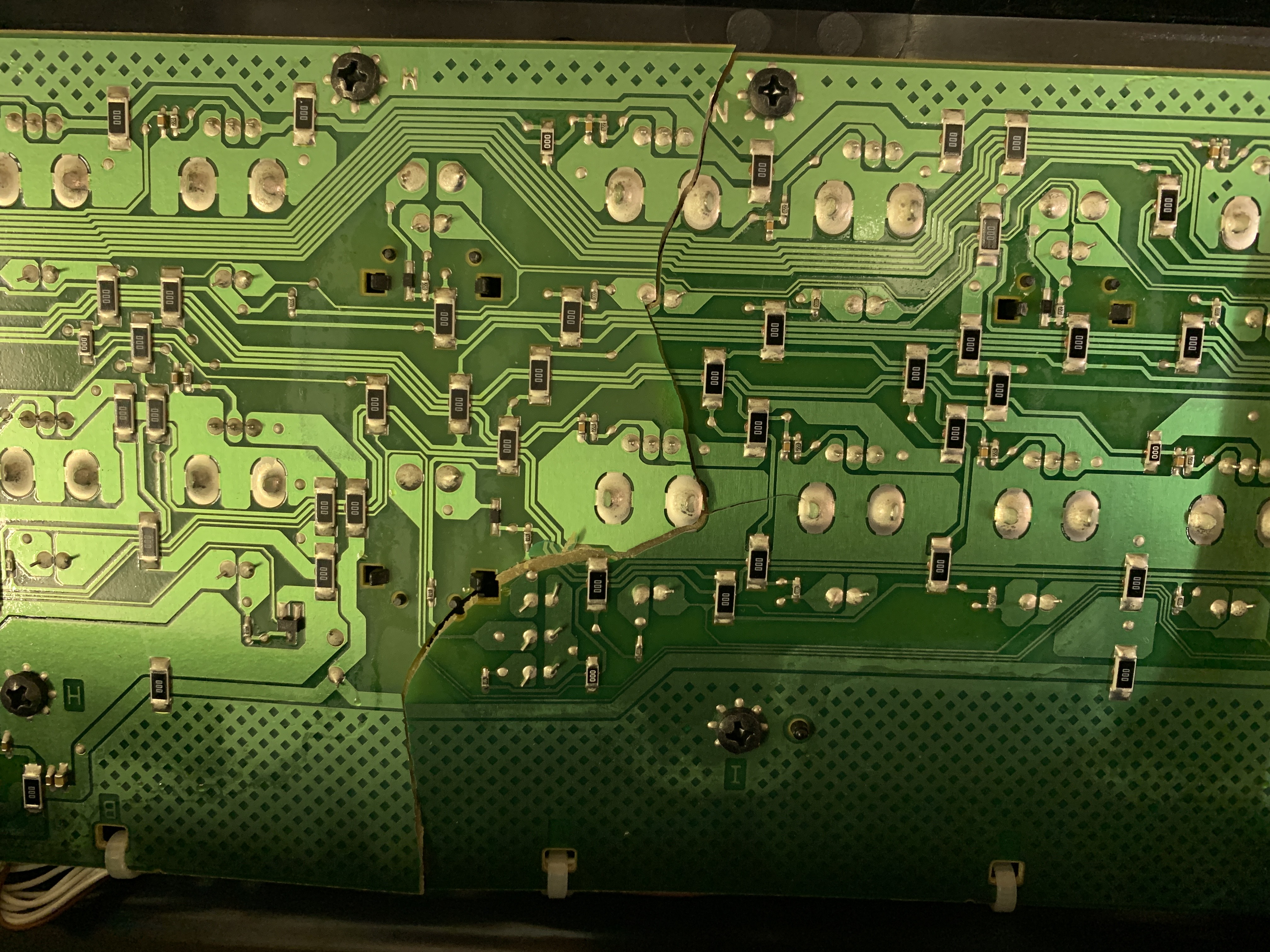 Roland photo 5 - showing damage to Roland circuit board under the EQ button.jpg